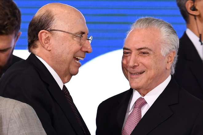 Henrique Meirelles e Michel Temer - EVARISTO SÁ / AFP (15/5/2018)