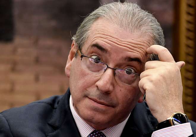 Eduardo Cunha e Geddel Vieira Lima são acusados de receber propina  - EVARISTO SA/ AFP