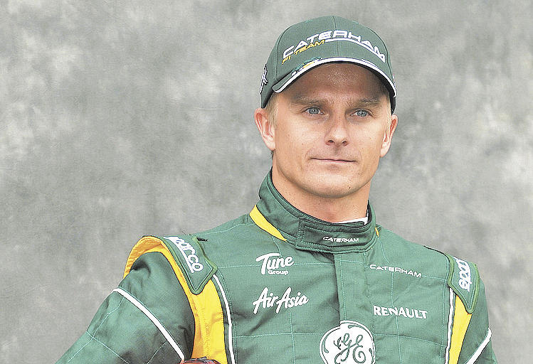 A Lotus espera que Heikki Kovalainen contribua com sua experiência - AFP PHOTO / PAUL CROCK